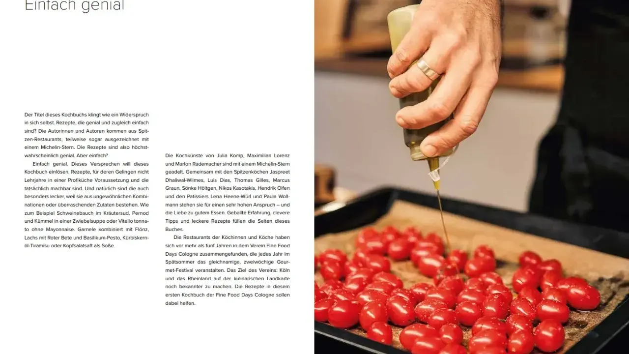 Ein Koch bereitet Tomaten für die Fine Food Days zu, indem er sie mit einer Sauce beträufelt.